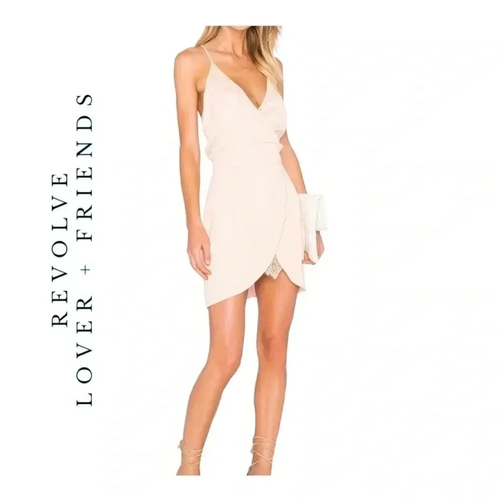 1058. Revolve X LOVERS + FRIENDS SOULMATE MINI DRESS IN PAPAYA SIZE SMALL
